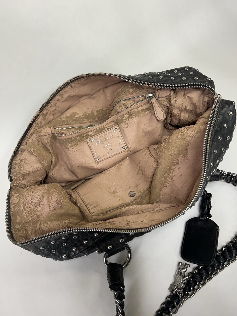 Prada handtas voering vervangen